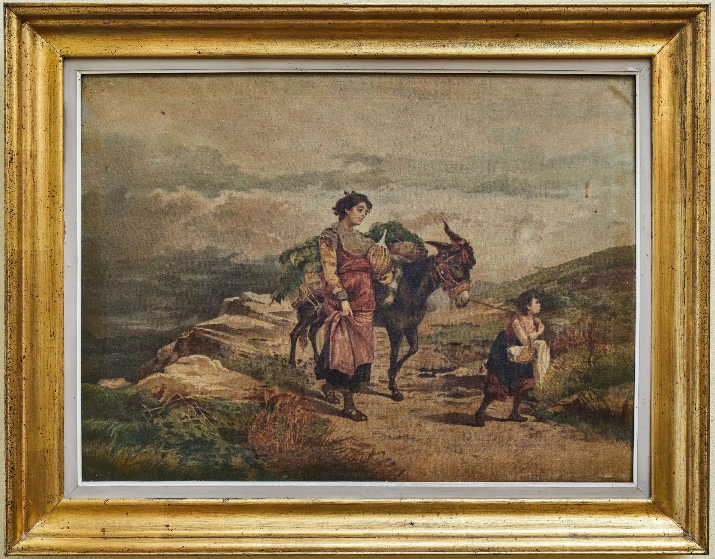 Starožitný tisk na plátně – venkovská scéna s ženou, dítětem a oslem ve zlaceném rámu 81 × 103 cm